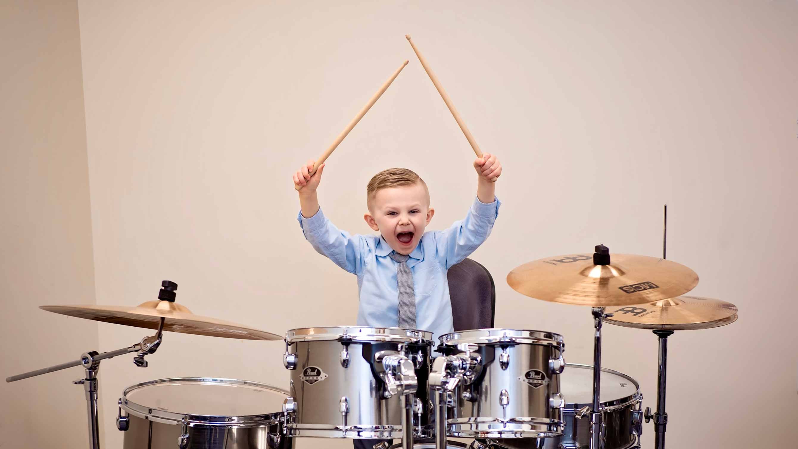 Photo of little boy drumming